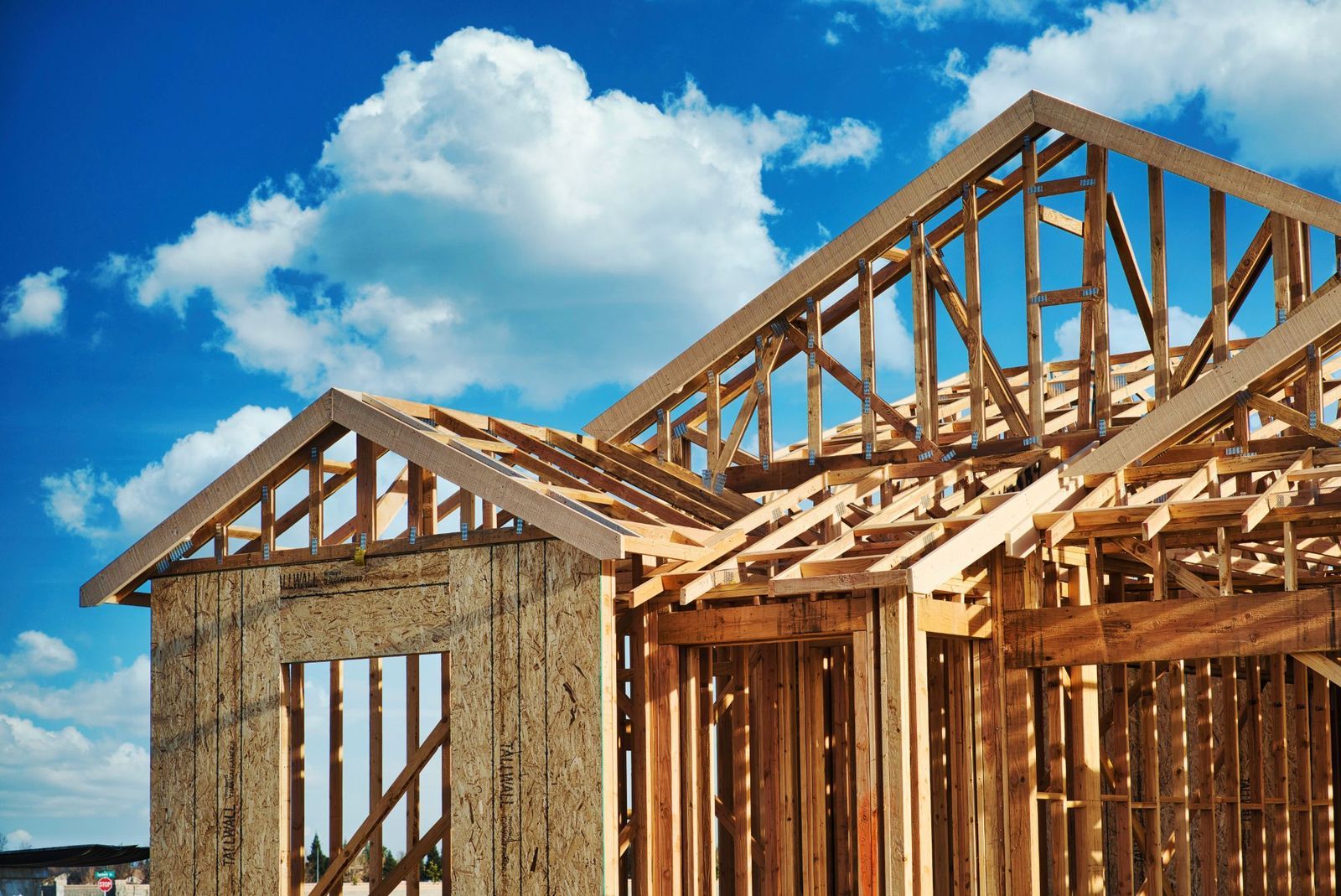 Wood framing and roof trusses of a new home under construction