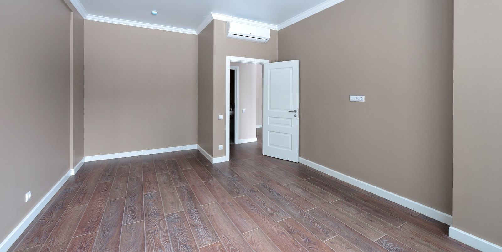 Empty, freshly painted rental bedroom
