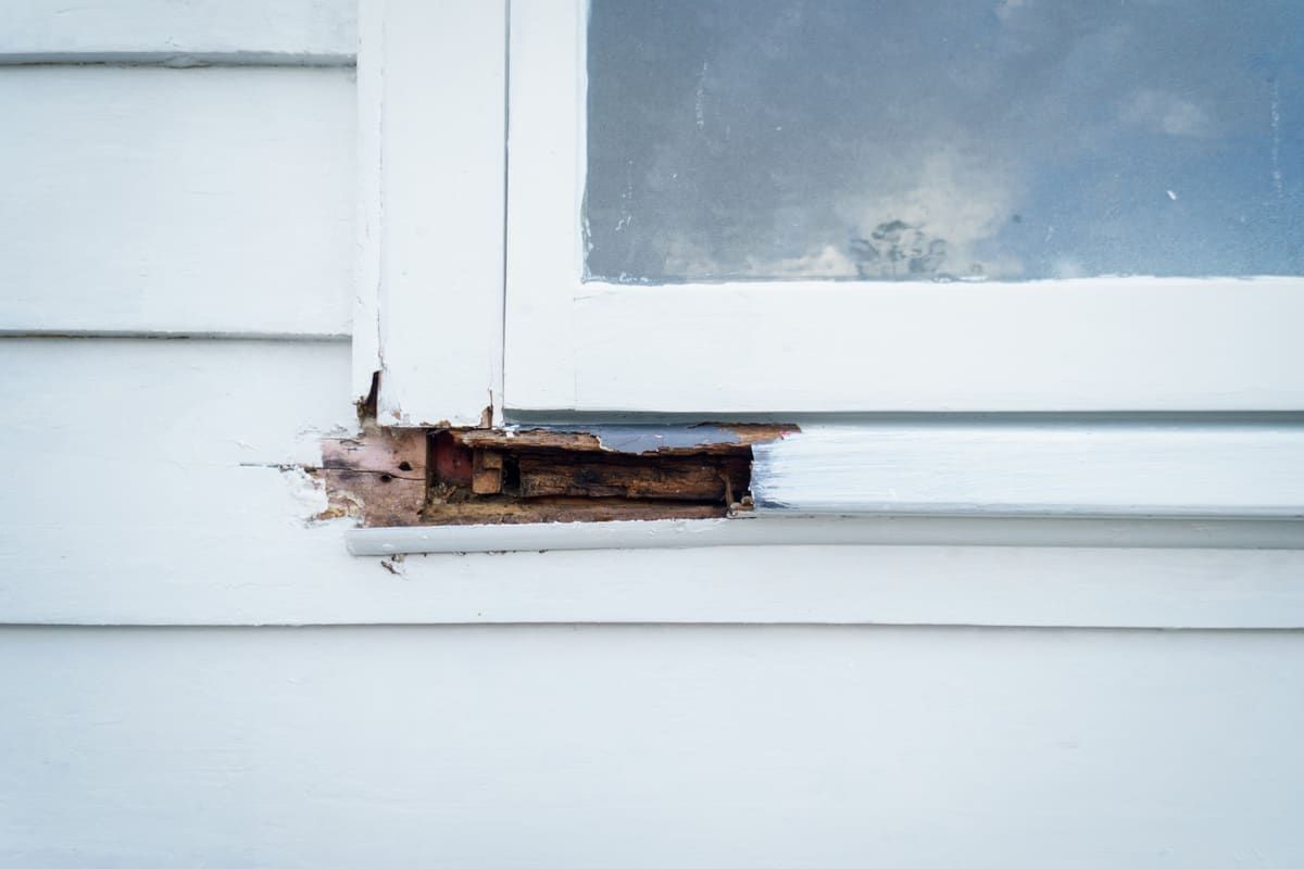 Rotted wood at an exterior window sill